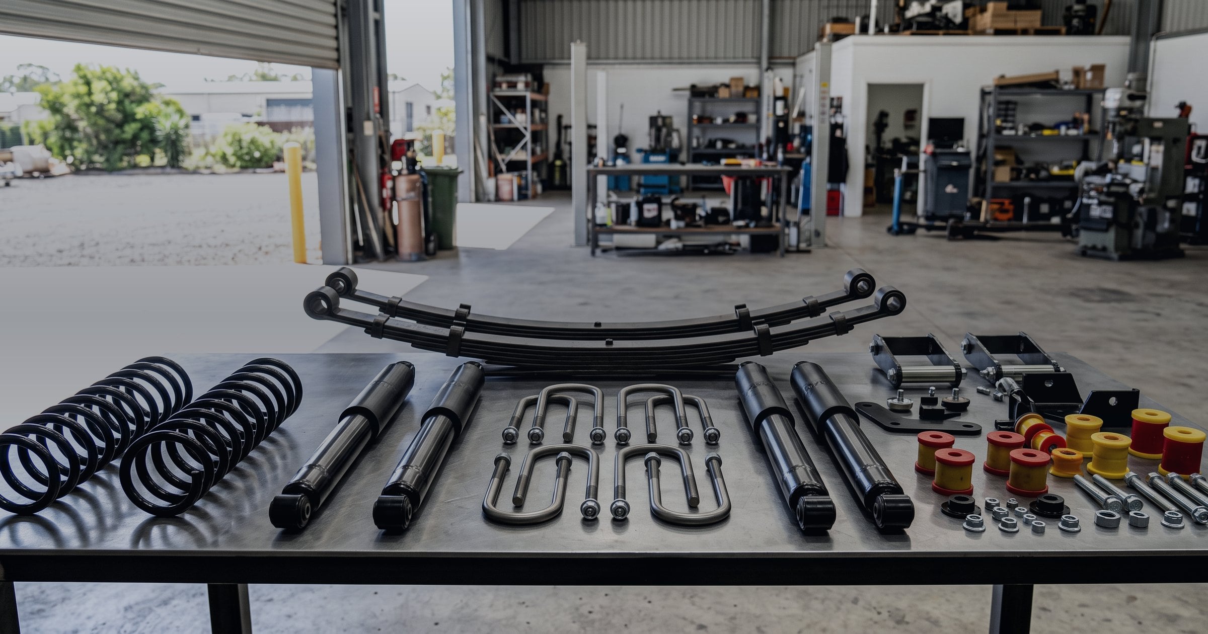 A West Coast Suspensions lift kit for a Ford Ranger laid out before fitting